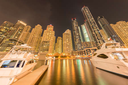 Dubai - AUGUST 9, 2014: Dubai Marina district on August 9 in UAE. Dubai is fastly developing city in Middle Eastのeditorial素材