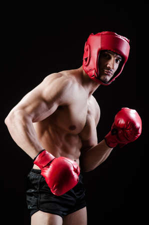 Muscular man in boxing conceptの写真素材