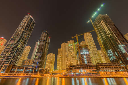 Dubai - AUGUST 9, 2014: Dubai Marina district on August 9 in UAE. Dubai is fastly developing city in Middle Eastのeditorial素材