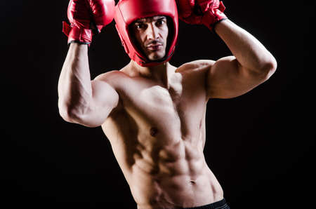 Muscular man in boxing conceptの写真素材