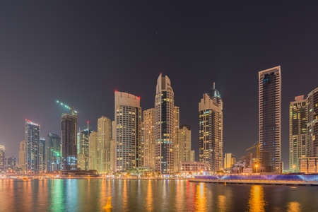 Dubai - JANUARY 10, 2015: Marina district on January 10 in UAE, Dubai. Marina district is popular residential area in Dubaiのeditorial素材