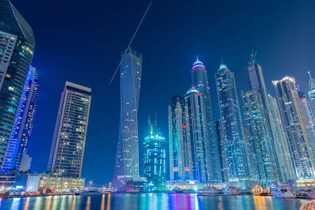 Dubai - JANUARY 10, 2015: Marina district on January 10 in UAE, Dubai. Marina district is popular residential area in Dubaiのeditorial素材
