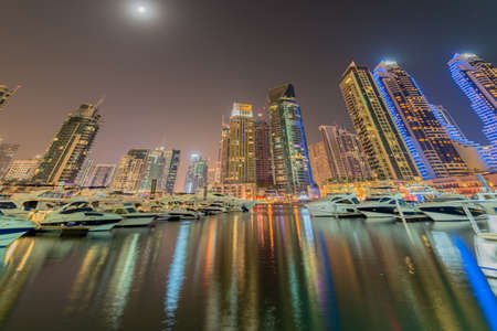 Dubai - JANUARY 10, 2015: Marina district on January 10 in UAE, Dubai. Marina district is popular residential area in Dubaiのeditorial素材