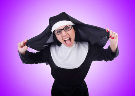 Funny nun isolated on the whiteの写真素材
