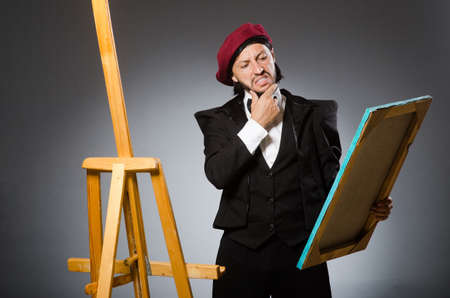Funny artist working in the studioの写真素材