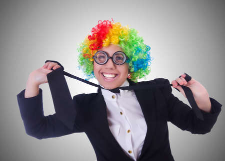 Woman clown businesswoman isolated on whiteの写真素材