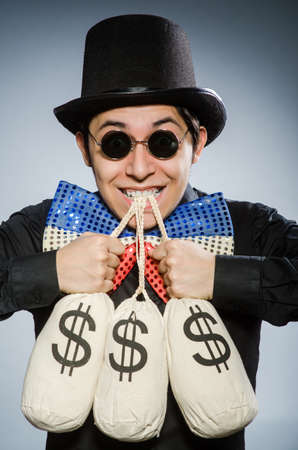 Funny man with money dollar sacksの写真素材