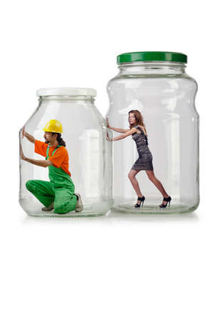 People trapped in the glass jarの写真素材
