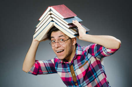 Funny student with many books
