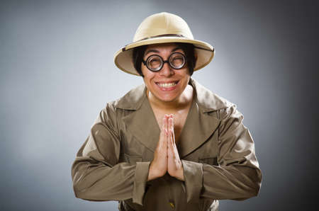 Man wearing safari hat in funny conceptの写真素材