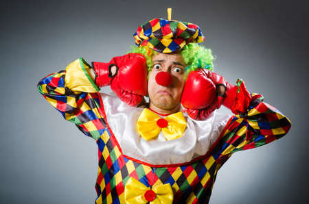 Funny clown in comical concept