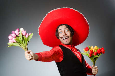 Person wearing sombrero hat in funny conceptの写真素材