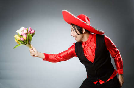 Person wearing sombrero hat in funny conceptの写真素材