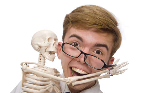 Funny doctor with skeleton isolated on whiteの写真素材