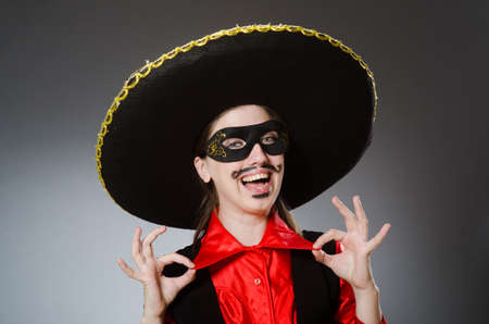 Person wearing sombrero hat in funny conceptの写真素材