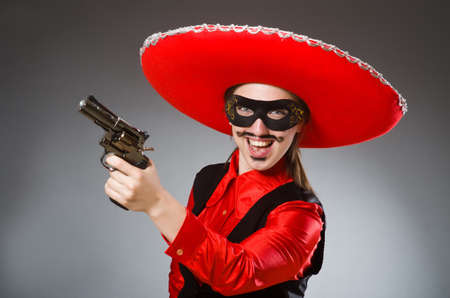 Person wearing sombrero hat in funny conceptの写真素材