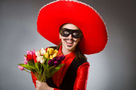 Person wearing sombrero hat in funny conceptの写真素材