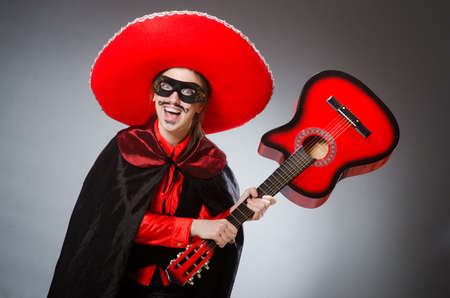 Person wearing sombrero hat in funny conceptの写真素材