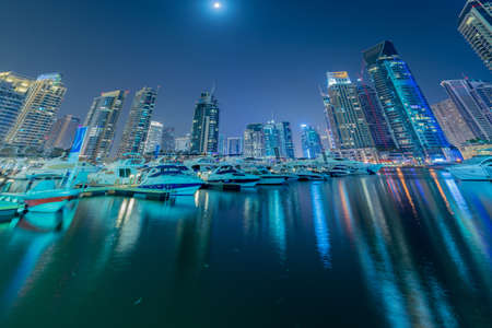 Dubai - JANUARY 10, 2015: Marina district on January 10 in UAE, Dubai. Marina district is popular residential area in Dubaiのeditorial素材