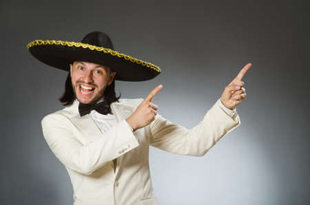 Person wearing sombrero hat in funny conceptの写真素材