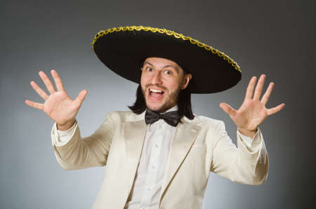 Person wearing sombrero hat in funny conceptの写真素材