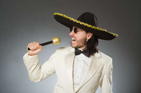 Person wearing sombrero hat in funny conceptの写真素材