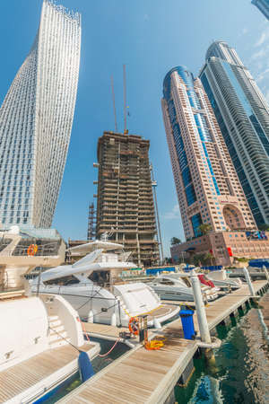 Dubai - AUGUST 9, 2014: Dubai Marina district on August 9 in UAE. Dubai is fastly developing city in Middle Eastのeditorial素材