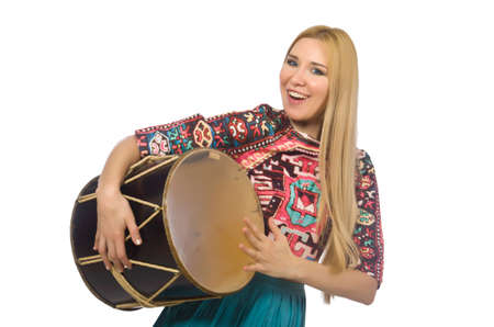 Woman with drum isolated on whiteの写真素材