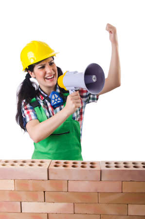 Woman with loudspeaker isolated on whiteの写真素材