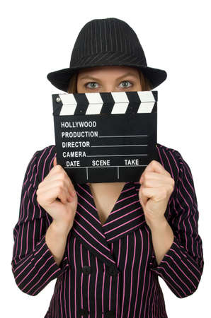 Woman with movie clapboard isolated on whiteの写真素材