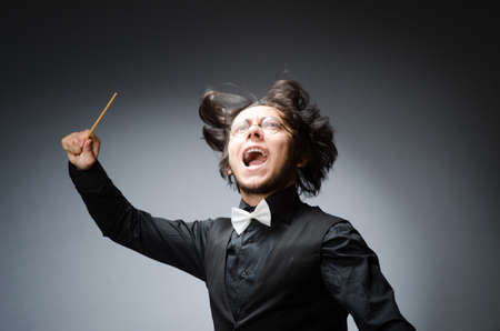 Funny conductor in musical conceptの写真素材