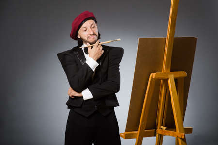 Funny artist working in the studioの写真素材