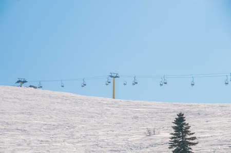 Ski lifts durings bright winter dayの写真素材
