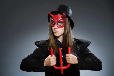 Funny devil in halloween concept