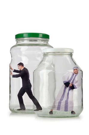 People trapped in the glass jarの写真素材