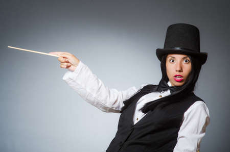 Woman magician in funny conceptの写真素材