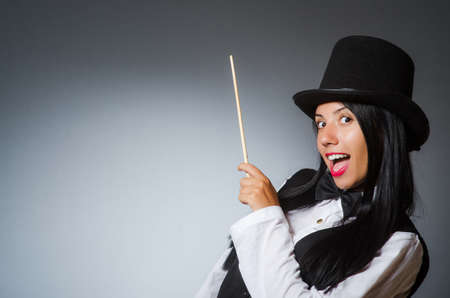 Woman magician in funny conceptの写真素材