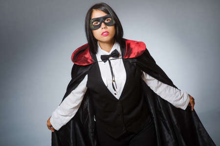 Woman magician in funny concept