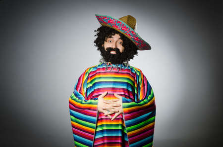 Person wearing sombrero hat in funny conceptの写真素材