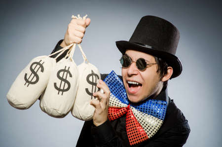 Funny man with money dollar sacksの写真素材