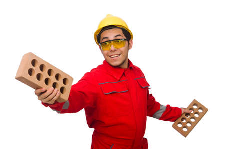 Construction worker with clay bricks on white