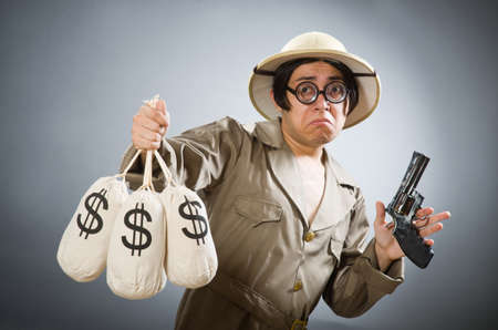 Man wearing safari hat in funny conceptの写真素材
