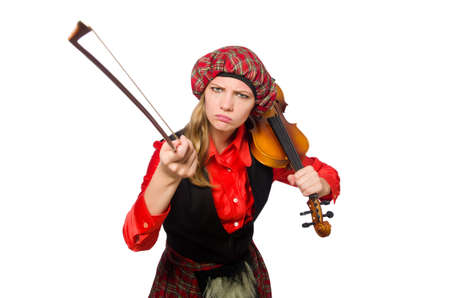 Funny woman in scottish clothing with violinの写真素材