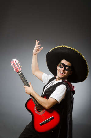 Person wearing sombrero hat in funny conceptの写真素材