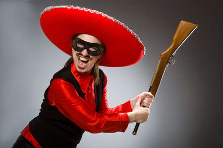 Person wearing sombrero hat in funny conceptの写真素材