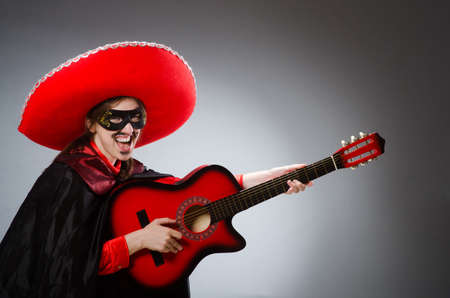 Person wearing sombrero hat in funny conceptの写真素材