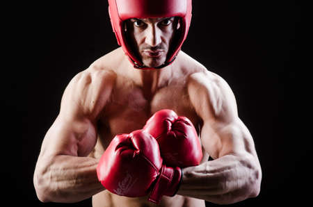 Muscular man in boxing conceptの写真素材