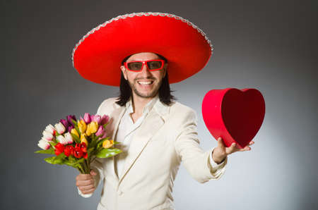 Person wearing sombrero hat in funny conceptの写真素材