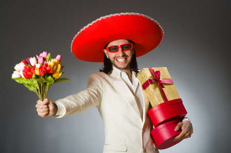 Person wearing sombrero hat in funny conceptの写真素材