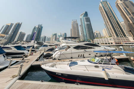 Dubai - AUGUST 9, 2014: Dubai Marina district on August 9 in UAE. Dubai is fastly developing city in Middle Eastのeditorial素材